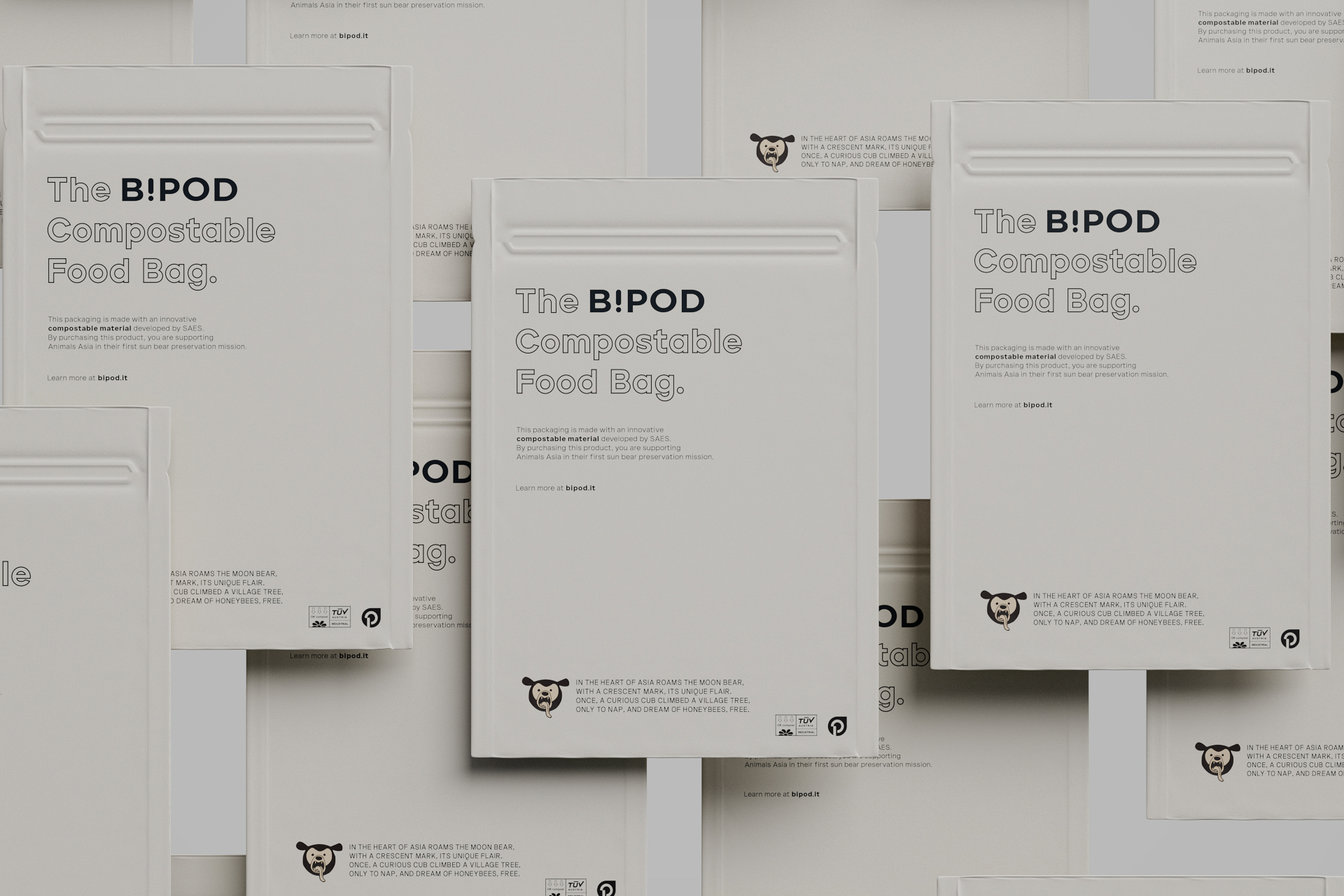 Composition of overlapping compostable food bags showing typography and technical information