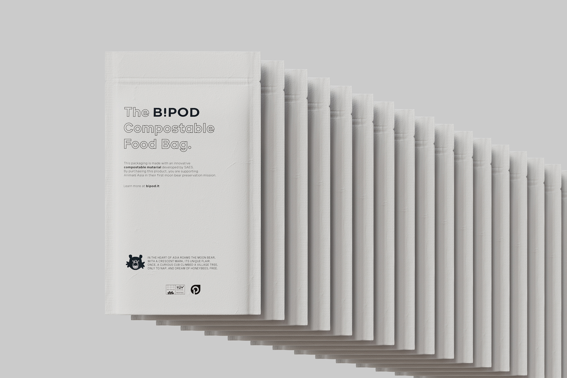 Series of white compostable food bags arranged in a progressive sequence