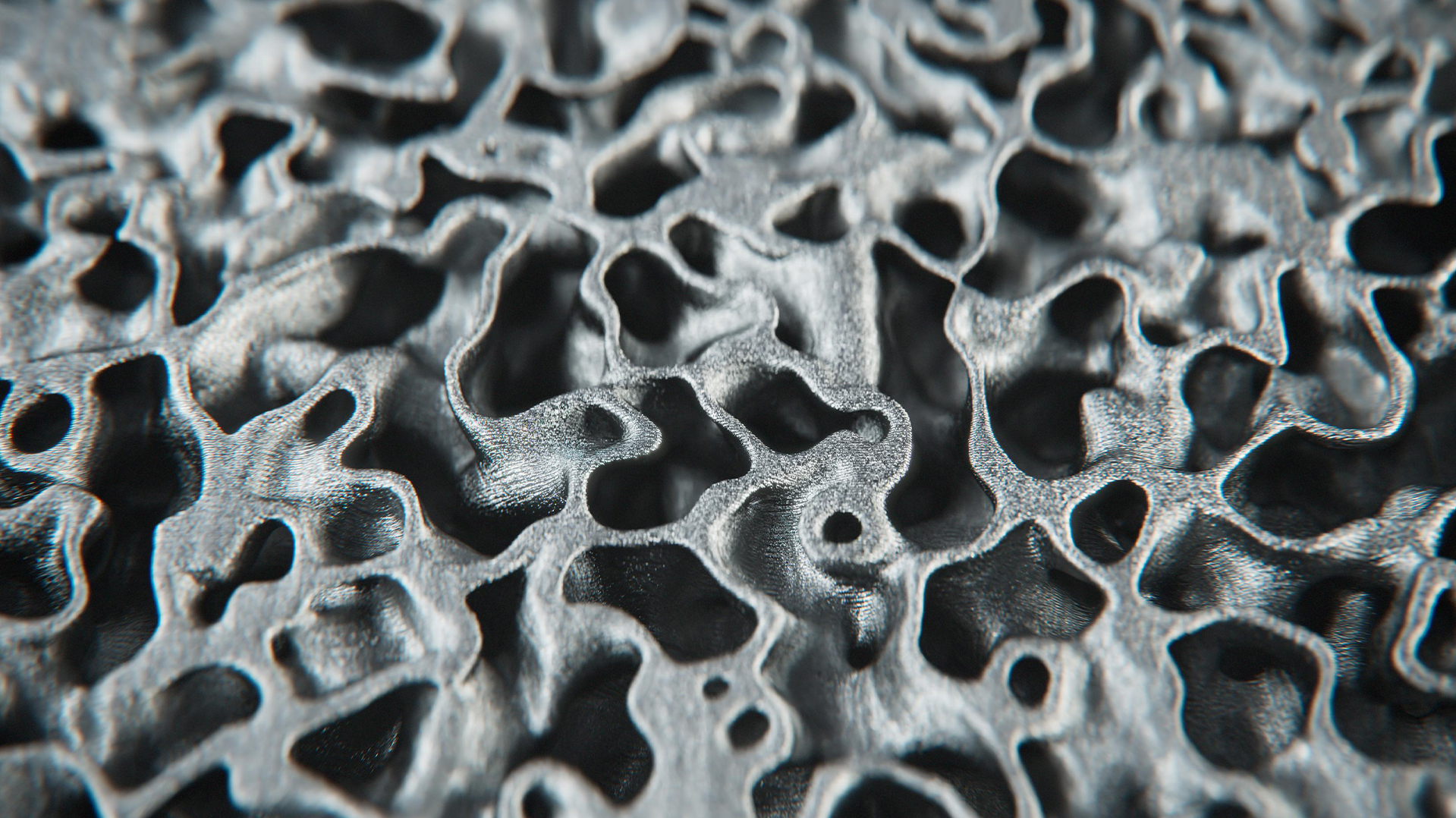 Procedural generation of TPMS structures for sintered metal alloys using implicit mathematical fields in a Volume Wrangle